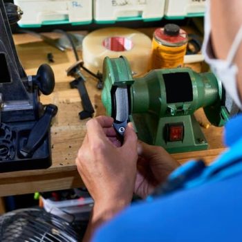 man-polishing-detail_1098-21317